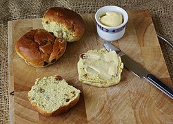 Krentenbollen are eaten with butter or cheese