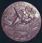 Above the two figures on a bed is an image inside a shutter. This image shows a sexual scene between two people. Bronze mirror cover. 70 - 90 CE