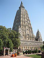The Mahabodhi Temple towering above its surroundings like a skyscraper carved of stone