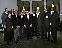 Sanders (far right) and his Celtics teammates pose with President John F. Kennedy in the Oval Office of the White House in January 1963