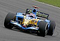 Renault's employment of Fernando Alonso (shown driving the Renault R25 at the 2005 British Grand Prix) also saw Telefónica become a major sponsor of the team.