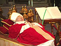 The body of Pope John Paul II lying in state at Saint Peter's Basilica, 2005.