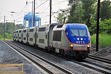 A MARC HHP-8 leads an express train into Odenton station in Odenton, Maryland