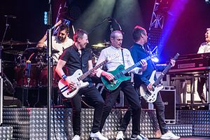 Status Quo performing in 2017 From left: Leon Cave (on drums), Richie Malone, Francis Rossi, John Edwards, Andy Bown