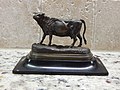 Miniature cabinet bronze of a dairy cow on a slate plinth