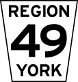 Typical Ontario county/regional road sign using an inverted isosceles trapezoid