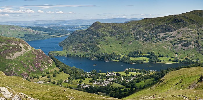 The village of Glenridding and Ullswater in the Lake District. This view is looking east from the hills at the start of the ascent to Helvellyn.