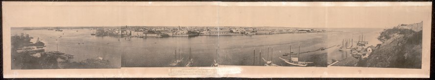 Panoramic view of Havana, showing the entrance to the harbor and inner harbor; taken from Cabanas Fortress showing Morro Castle on the extreme right-hand Malecón