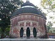 Rajbalhat: The Radhakantajiu (in picture) and other temples are there. Durga is worshipped in Jangipara and Rajbalhat as Rajballavi. She is a mixed form of Durga, Kali and Saraswati.[33] It is famous for handloom saris.[32]