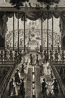 The coronation procession of Shah Safi II in a great hall.