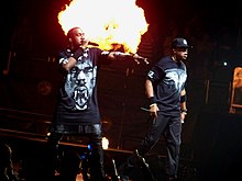 West performing with Jay-Z on the Watch the Throne Tour in 2011