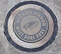 The mounting point for Veterans Stadium's west end zone goalpost, used by the Philadelphia Eagles for 32 seasons, is marked in the same parking lot (the east goalpost is similarly marked). (2011)