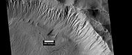 Gullies near Newton Crater, as seen by HiRISE, under the HiWish program. Place where there was an old glacier is labeled.