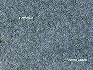 The Phoenix lander and its heatshield as seen by HiRISE