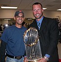 Tim Wakefield (right) with the Commissioner's Trophy