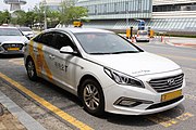 Kakao Taxi branded taxi cab in Daejeon near the Expo Park