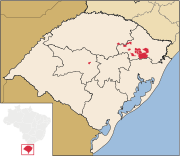 Municipalities in which Talian is co-official in Rio Grande do Sul, Brazil, highlighted in red: Bento Gonçalves,[22] Caxias do Sul,[23] Flores da Cunha,[24] Nova Roma do Sul,[25][26] and Serafina Corrêa.[27]