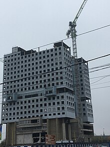 The demolition of the building's upper floors on October 2023.