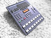 A photograph of the model of drum machine used on Streetcleaner against a carpet background