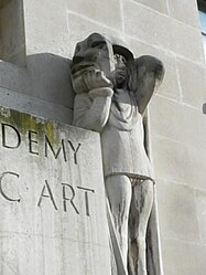 Part of Durst's sculpture over the entrance to the Royal Academy of Dramatic Art.