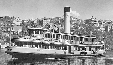 Kirawa in Mosman Bay in her 1930 yellow and green colour scheme, early 1950s