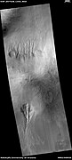 Gullies on two sides of a mound, as seen by HiRISE under HiWish program