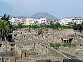 Vesuvius towers over modern Ercolano and the ruins of Herculaneum