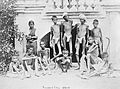 Famine in India; a group of emaciated young men wearing loin Wellcome