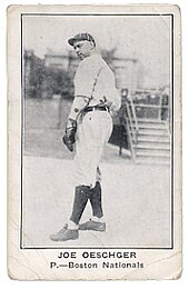 Baseball card of a man wearing an old-time baseball uniform
