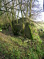 An old blast wall next to the station in 2008. The OS maps show that a railway line ran from near here to the Lime Kilns at Nettlehirst until at least 1912.