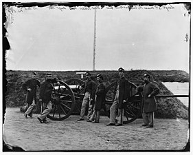 Sergeants of 3rd Massachusetts Heavy Artillery, with gun and caisson at Fort Totten
