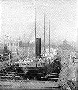 Steamer EC Pope in Detroit Dry Dock No 2, c. 1894. Note machine shop in left background and Dry Dock Hotel in right background.[5]