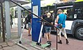 Shared electric scooters at the public transport stop in town in Poland