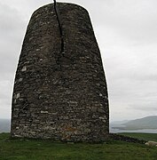 Eask Tower, with the tip of the Ring of Kerry in the background.