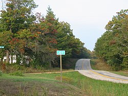 Joy road marker in 2003. The sign was not present in 2017.