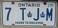 Personalized licence plate. Note the use of the crown as a character.