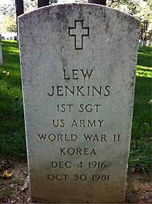 Lew Jenkins's headstone at Arlington National Cemetery, Virginia. Upright marble headstone, cross at top. Reads "LEW JENKINS, 1st SGT, US ARMY, WORLD WARR II, KOREA, DEC 4 1916, OCT 30 1981"