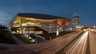 The BMW Welt exhibition center as seen at night