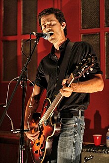 Bondy performing at an L.A. firehouse, 2010