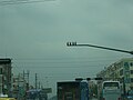 A set of traffic cameras in Dongguan, China.