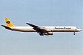 A German Cargo Douglas DC-8 approaches Frankfurt Airport in 1992.