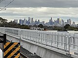 The view of Melbourne CBD from Preston station Platform 2, June 2023