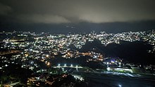Thousands of Shining lights like stars studded on hills seen at Solan from Night