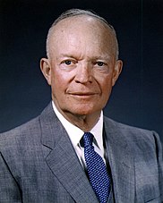 A portrait of a mostly-bald Dwight D. Eisenhower in uniform looking directly at the camera