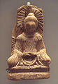 A Buddha statue from Tumshuq, Xinjiang. 5th century.