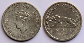 1946 half Rupee featuring George VI on obverse and Bengal tiger, year and country on reverse.