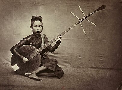 Cambodian musician playing a chapey