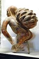 Ceramic Sculpture of Person with Load on his Back
