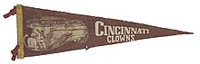 Maroon and gold pennant with the Cincinnati Clowns Logo.