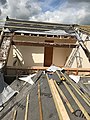 Dormer extension with tiles and felt stripped off and wood battens removed